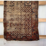 Vintage throw rug with animal detail
